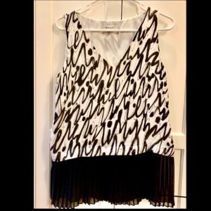 Elegant Milly sleeveless silk blouse/ top.